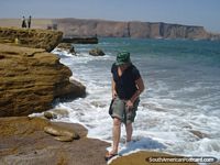 Cool your feet off at red-stone beach in Paracas, Pisco. Peru, South America.