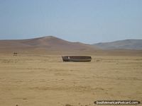 In 2007 the earthquake in Pisco created a tsunami at Paracas pushing this boat several kms inland. Peru, South America.
