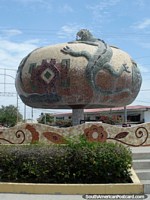 Larger version of The big round iguana monument in Sullana.