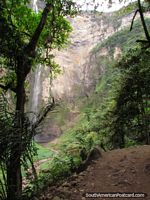 Gocta Falls and red cliff face from the walking track, Chachapoyas.