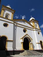 White and yellow church with dual bell-towers in Cajabamba. Peru, South America.
