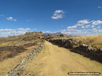 Walking towards the castle at Marcahuamachuco ruins, Huamachuco. Peru, South America.