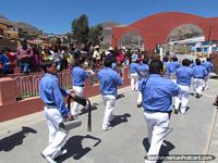 Brass band, archways and mountains in Huamachuco. Peru, South America.