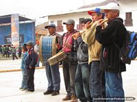 Traditional band of flutes and drums play in Huamachuco. Peru, South America.