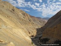 Peru Photo - Road following the valley through the rocky terrain near Chuquicara.