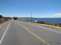 The road beside Lake Titicaca from Puno to Yunguyo. Peru, South America.