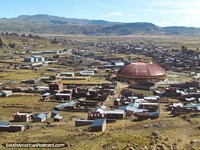 Larger version of Juli, a town near Lake Titicaca with its prominent dome building.