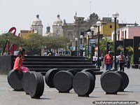 A bunch of large coin-shaped objects at Parque Rimac in Lima. Peru, South America.