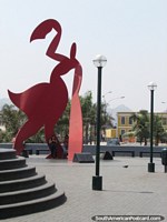 Larger version of Huge red figure artwork at Rimac Park in central Lima.
