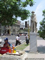 Larger version of White statue indicating that the art museum - Museo de Arte is across the road. Lima.