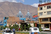 San Sebastian church in the distance with mountains behind in Huanuco. Peru, South America.