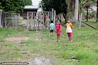 2 girls from the Amazon near Pucallpa outside their house. Peru, South America.