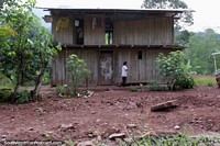 A 2 level wooden house in the Peruvian Amazon south of Tarapoto. Peru, South America.