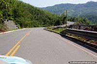 This road winds around the hill beside the Huallaga River, heading north to Juanjui and Tarapoto. Peru, South America.