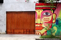Peruvian warrior of the jungle, beautiful colors, mural in Yurimaguas. Peru, South America.