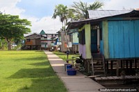 Larger version of Wooden houses in the Amazon community called Santa Maria de Fatima near Iquitos.