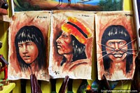Paintings of indigenous of the Amazon onto cloth, for sale at the Anaconda Arts Center in Iquitos. Peru, South America.