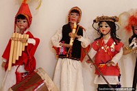 Sikuri dolls playing windpipes and dressed in traditional clothing, Carlos Dreyer Museum, Puno. Peru, South America.