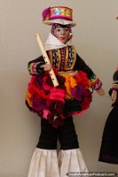Dancer with a wooden flute, wrapped in colored wool, doll, Carlos Dreyer Museum, Puno. Peru, South America.
