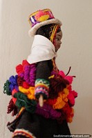 Alpaca wool dyed in many colors keeps the indigenous people warm, female doll at the Carlos Dreyer Museum, Puno. Peru, South America.
