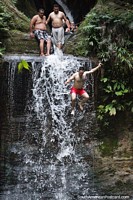 Carpishuyacu Waterfall in the jungle, man jumps down, Tarapoto. Peru, South America.