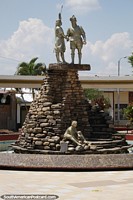 Larger version of The indigenous and the Spanish shake hands, monument at the plaza in Lamas.