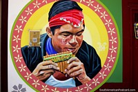 Yupanero, hombre toca instrumento tradicional de pipa de madera, mural en Lamas. Perú, Sudamerica.