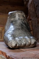 Larger version of Large stone foot at the entrance of the castle in Lamas.