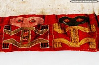 Fabric designed with frog figures on display at Leymebamba museum.