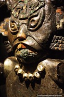 Copper funeral mask with intricate design, Moche culture, Sipan museum, Lambayeque. 