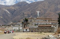 Main cemetery with Jesus statue with mountains behind at Campo Santo, Yungay. Peru, South America.