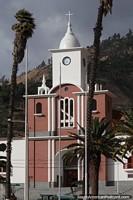 Church with clock tower at the main plaza in Yungay. Peru, South America.