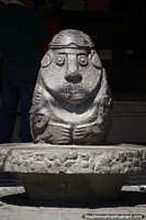 Figure sculptured in stone portraying an ancient culture in Huaraz. Peru, South America.