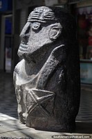 Replica of archeological discoveries, stone sculpture in Huaraz.   Peru, South America.