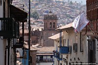Church towers are seen from all streets and angles in Cusco. Peru, South America.