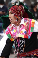 Larger version of Dancers perform in a variety of costumes in Cusco.