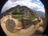Rocks, stone paths and mountains at Machu Picchu, 2430m above sea. Peru, South America.
