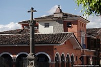Nice buildings with arches and a cross in Ayacucho. Peru, South America.