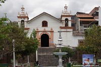 Church San Juan Bautista, park and fountain in Ayacucho. Peru, South America.
