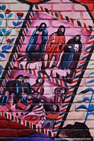 Religious figures, mural in red, purple and pink in Ayacucho. Peru, South America.