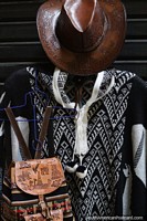 Leather hat and bag and black and white shawl, crafts center in Ayacucho. Peru, South America.