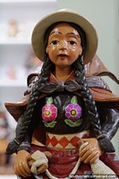 Peru Photo - Ceramic lady with a nice pair of flowers and long braided hair, Ayacucho arts center.