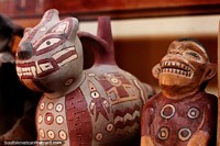 Ceramics at the Maria Reiche Museum near Nazca, the grinning man. Peru, South America.