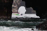 Rock tunnels at Islas Ballestas, tour of the islands by boat in Paracas. Peru, South America.