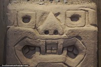 Ancient face carved from stone, the Chimu civilization at the Chan Chan museum, Trujillo. Peru, South America.