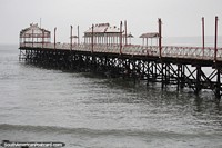 The pier in Huanchaco, inhabited by birds on this day.