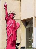 Larger version of Pink statue of liberty in Punta del Este to remember July 4th.