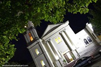 The church in Fray Bentos at night, view from the plaza. Uruguay, South America.