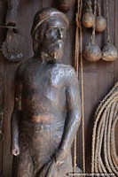 Uruguay Photo - Wooden sculpture of a man with beard, tools and ropes, Mazzoni Museum, Maldonado.