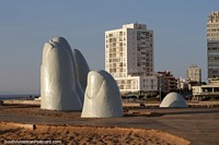 Huge hand monument called Los Dedos (fingers) in Punta del Este. Uruguay, South America.